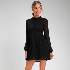 Black lace skater dress with long sleeves